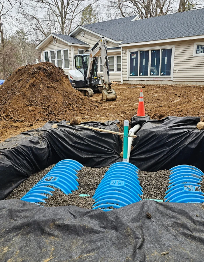 yard drainage being installed during excavation of yard